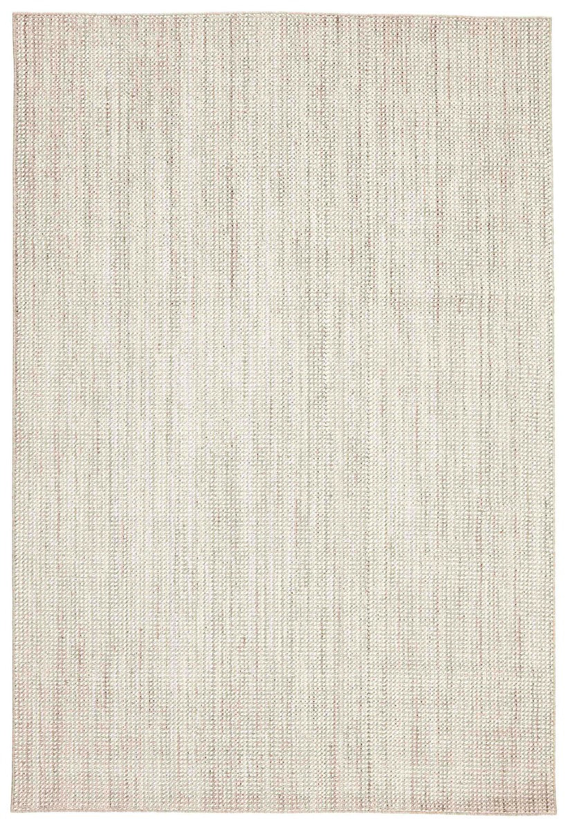 Textured area rug in stone and beige hues