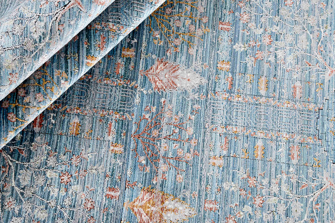 Blue heritage area rug with traditional pattern
