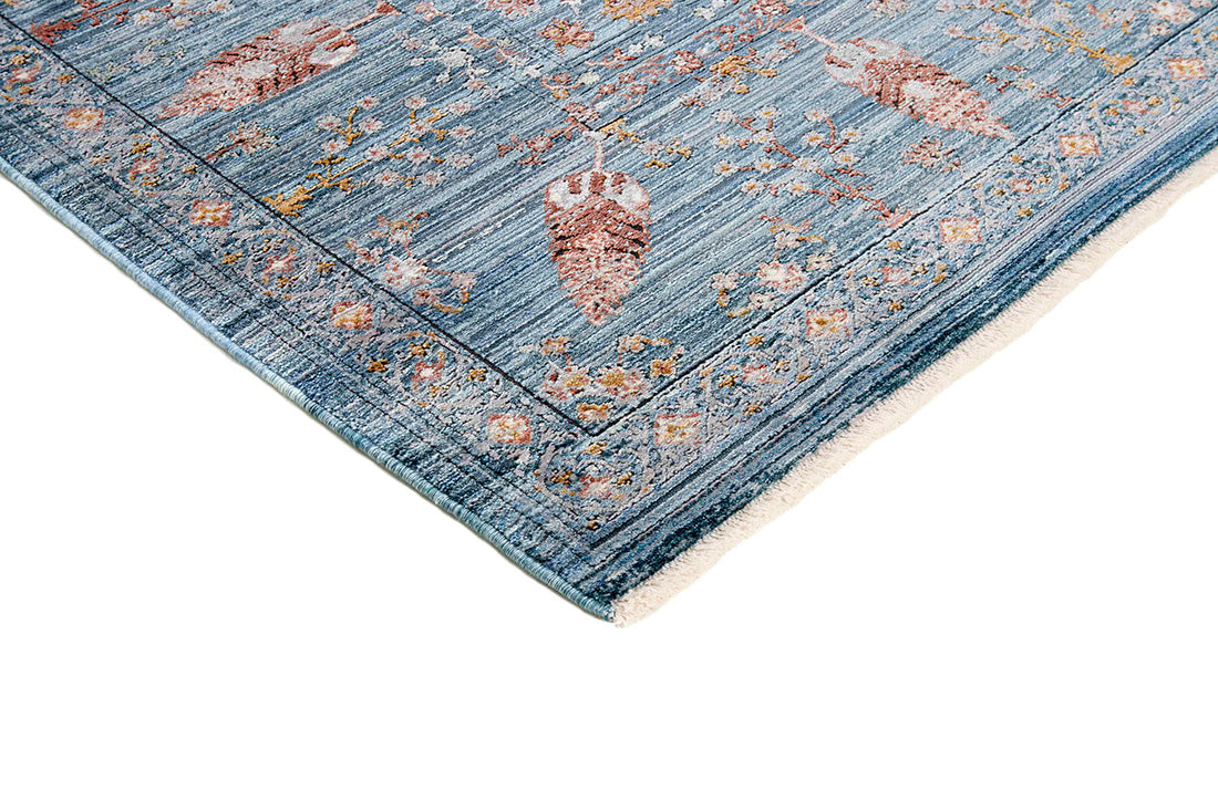 Blue heritage area rug with traditional pattern