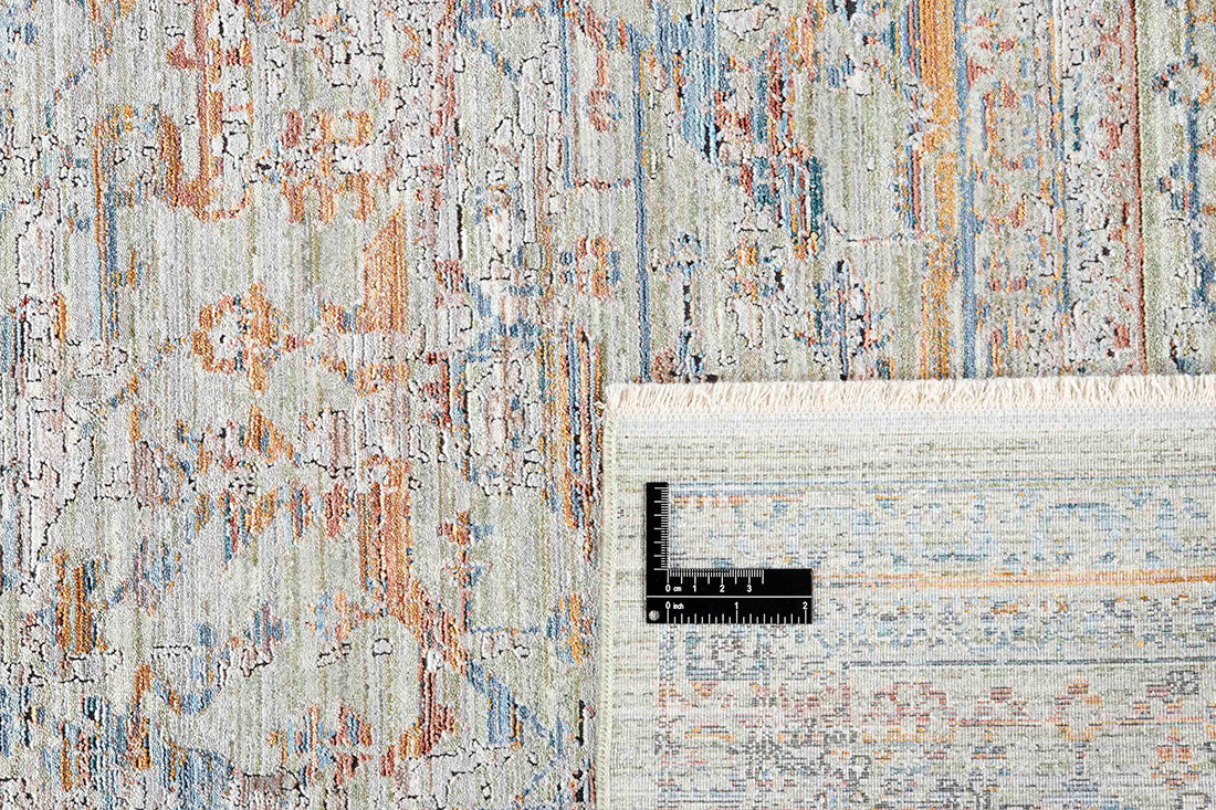 Green heritage area rug with traditional pattern