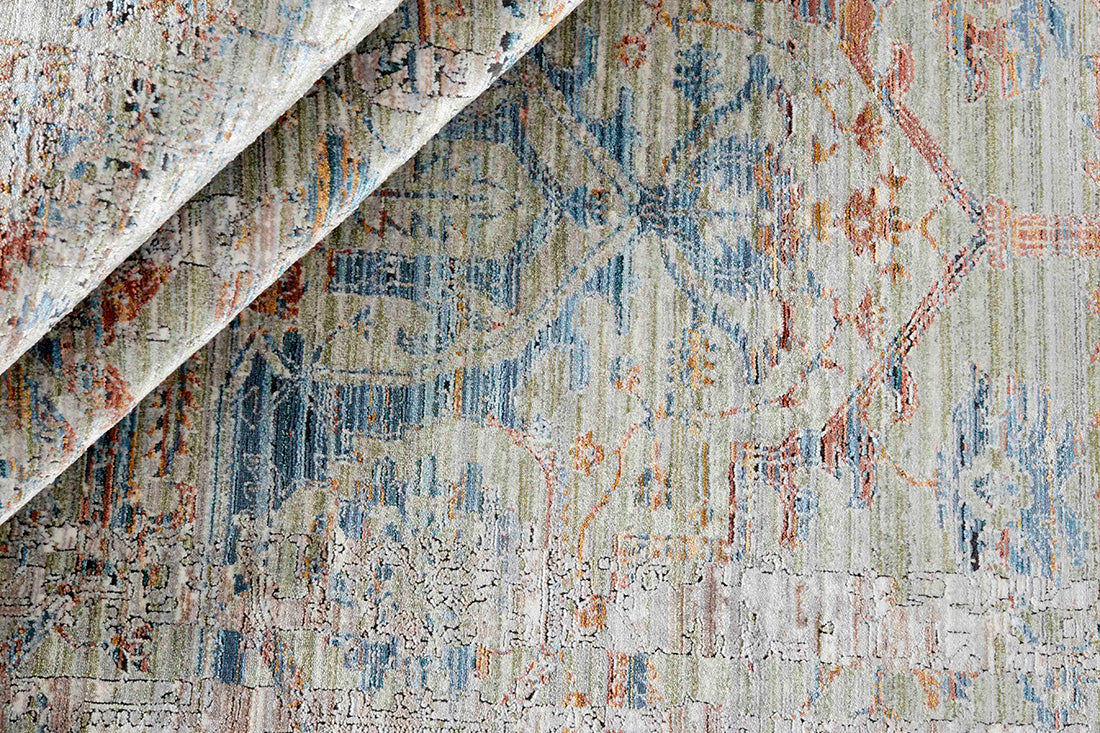 Green heritage area rug with traditional pattern