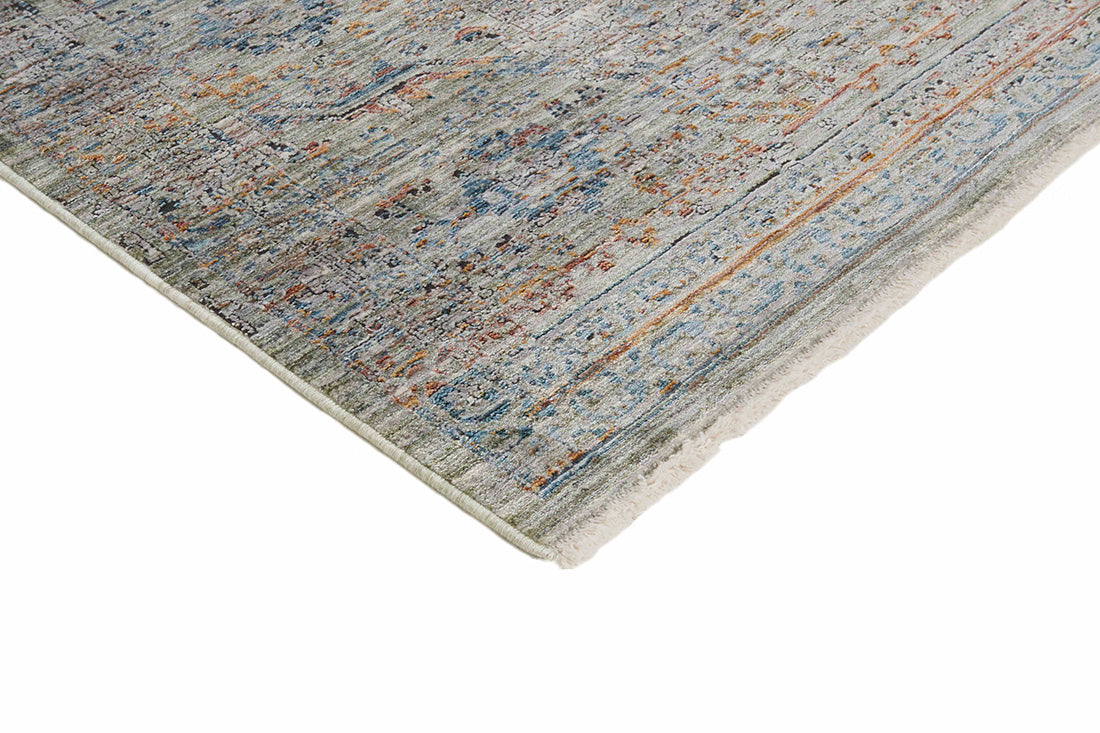 Green heritage area rug with traditional pattern