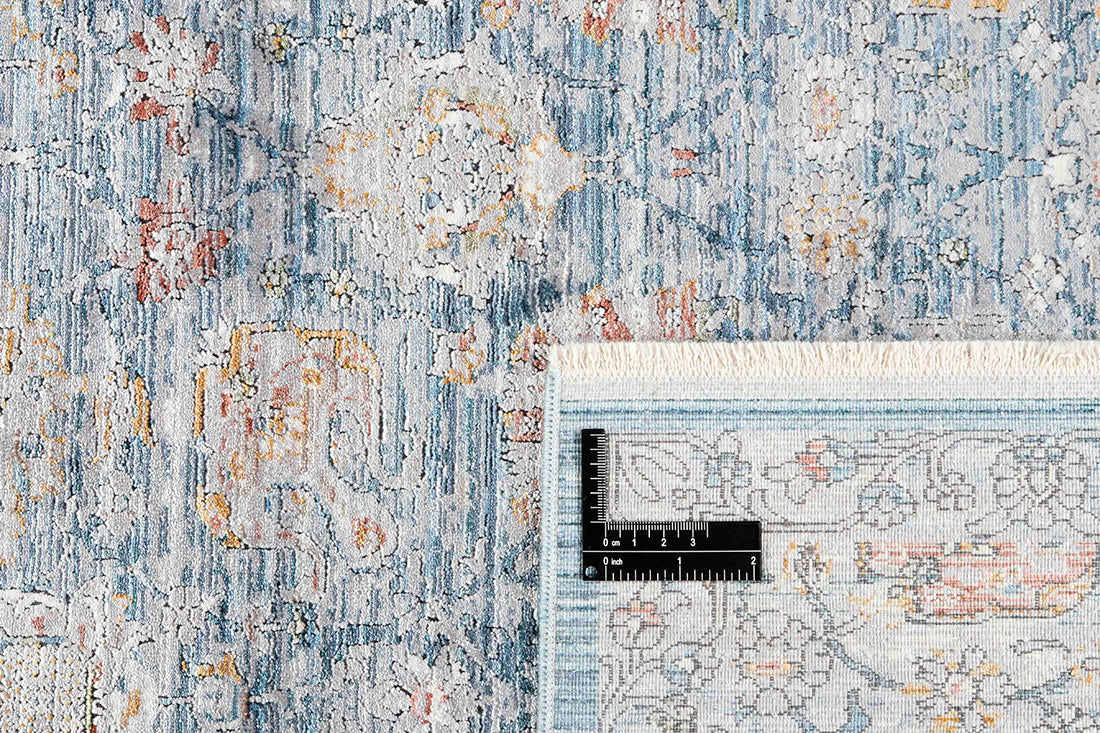 Floral blue heritage area rug with traditional pattern