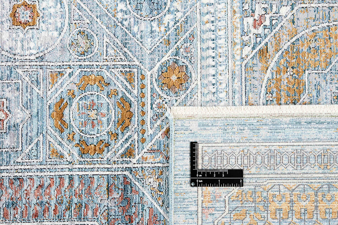 Ornate blue heritage area rug with traditional pattern
