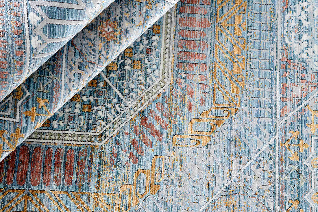 Ornate blue heritage area rug with traditional pattern