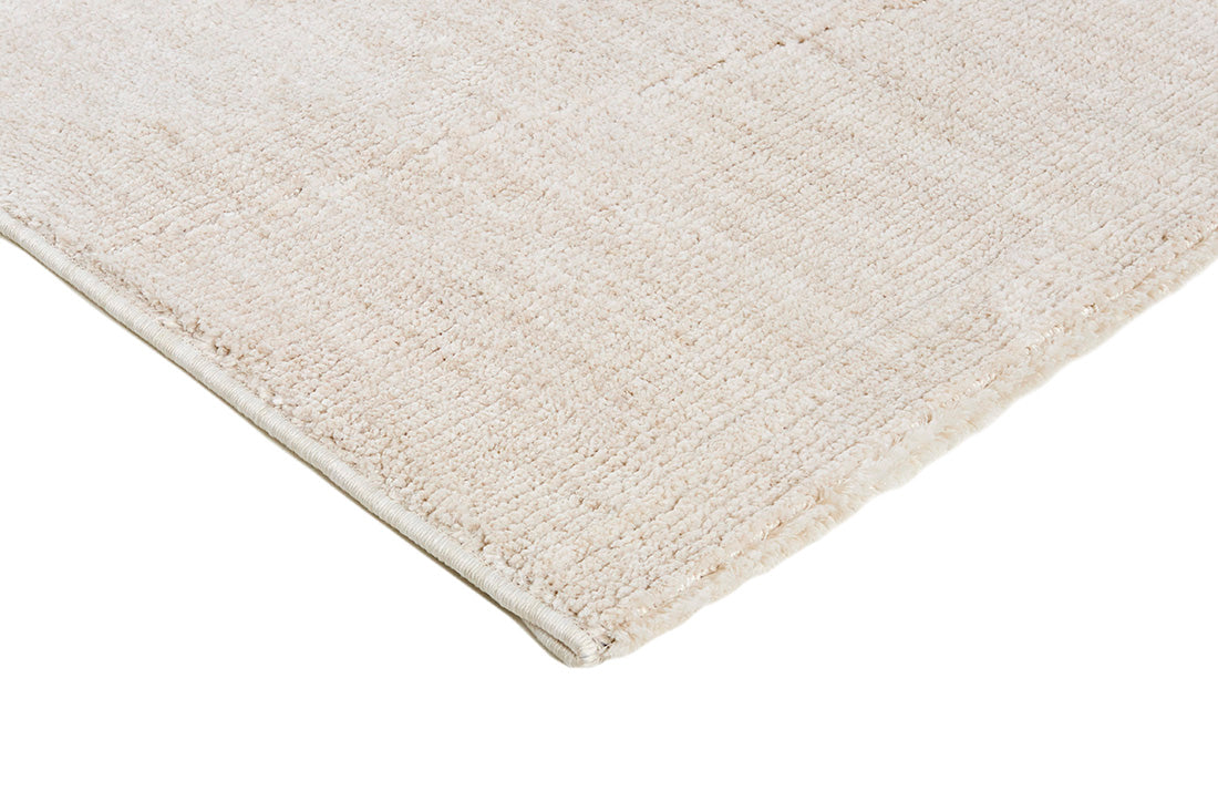 Cream rug with minimal geometric pattern