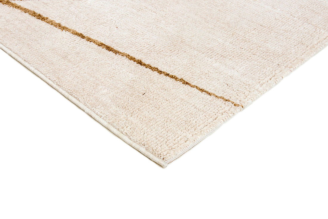 Cream rug with minimal gold geometric pattern