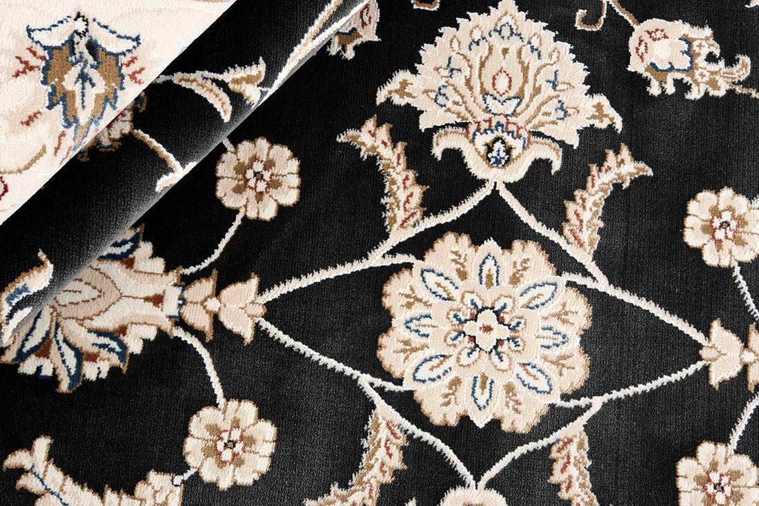 Traditional Persian Nain style rug. Detailed black pattern with a white border.