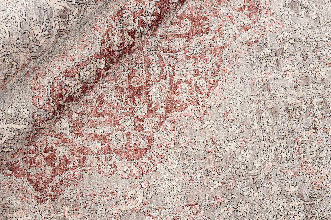 Traditional style rug with beige backing and red patterned border design