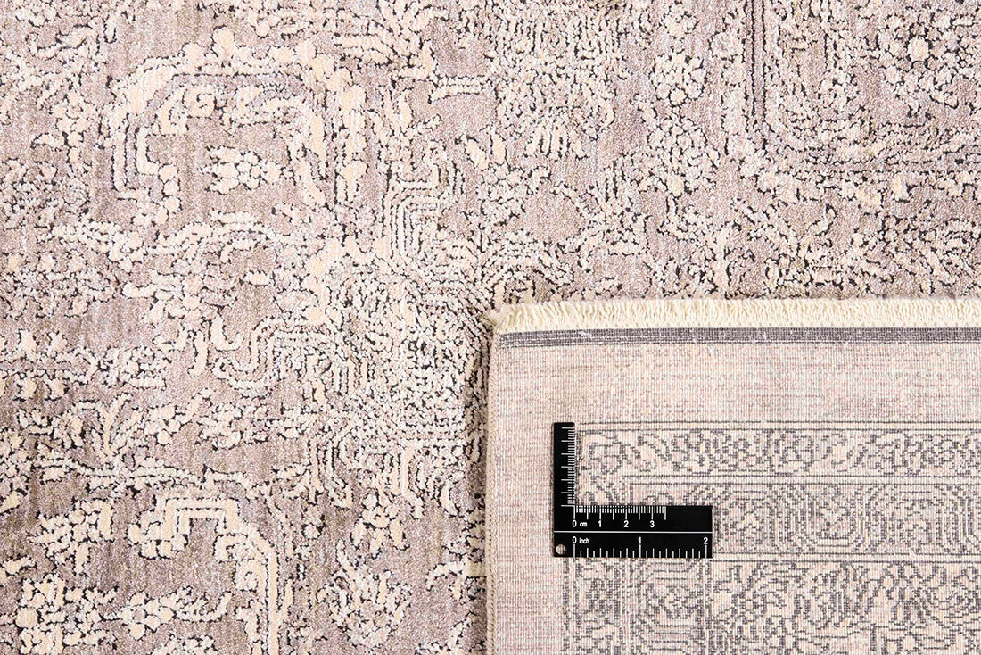 Traditional style rug with beige backing and patterned border design