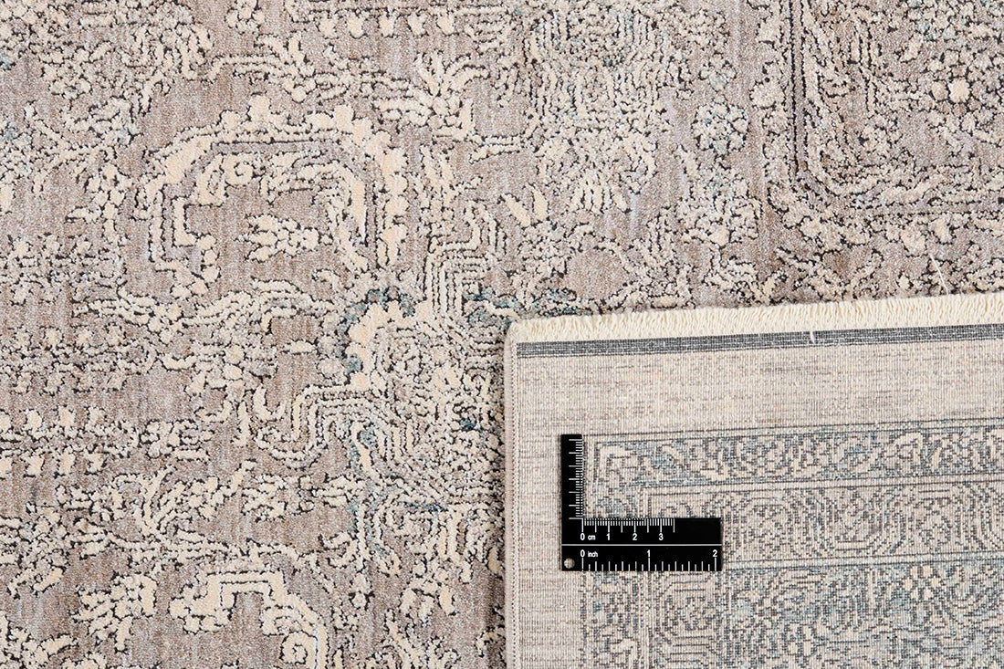 Traditional style rug with beige backing and blue patterned border design