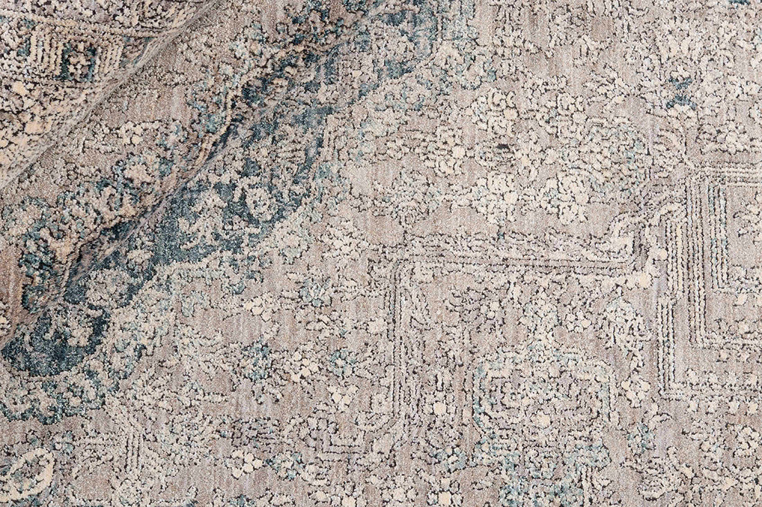 Traditional style rug with beige backing and blue patterned border design