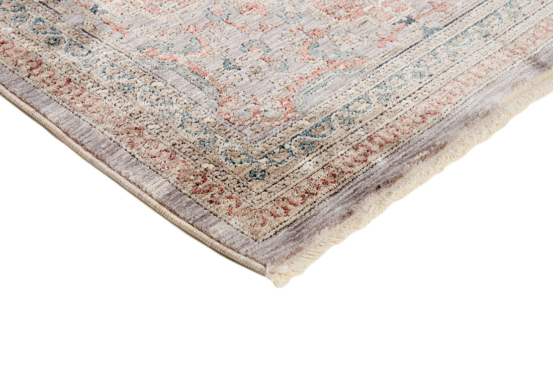 Traditional style rug with beige backing and patterned border design