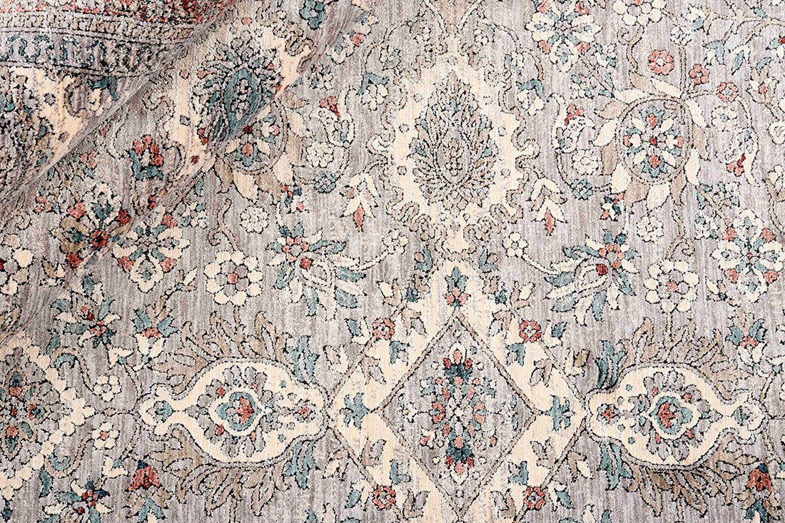 Traditional style rug with beige backing and patterned border design