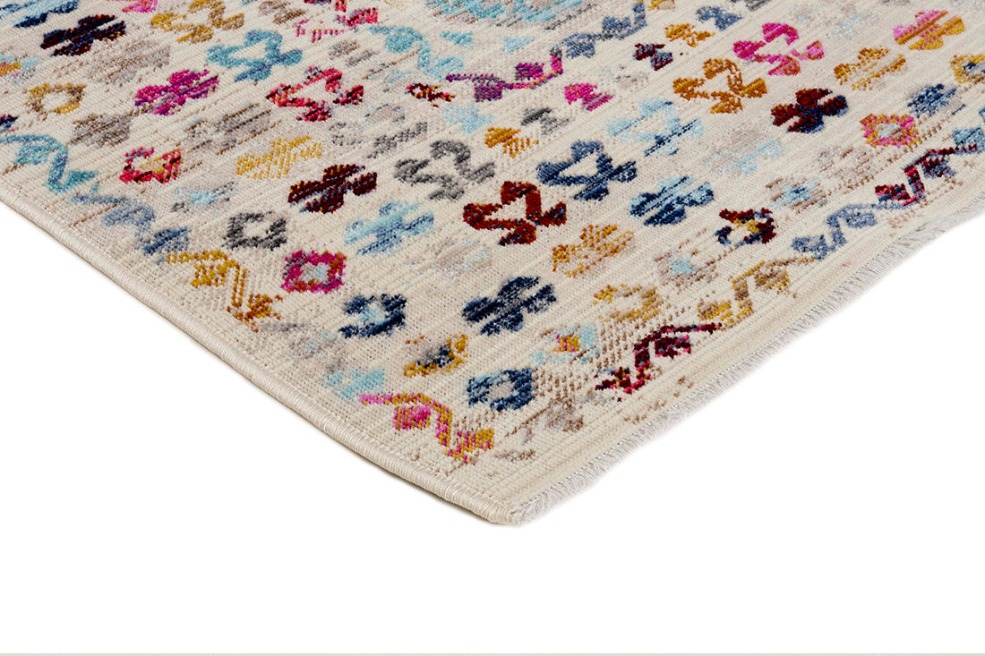 Traditional style Kilim rug with white background and multicolour pattern
