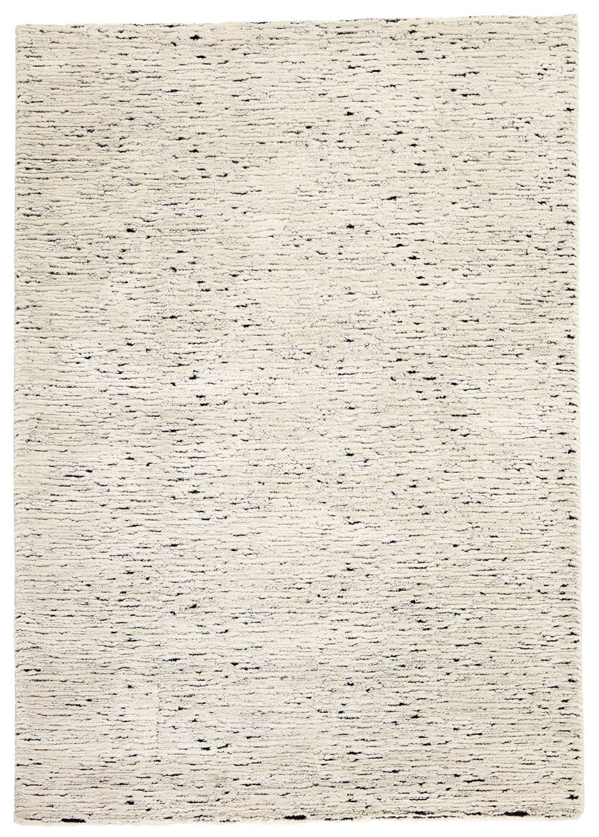 Plain cream Moroccan style rug with dark undertones
