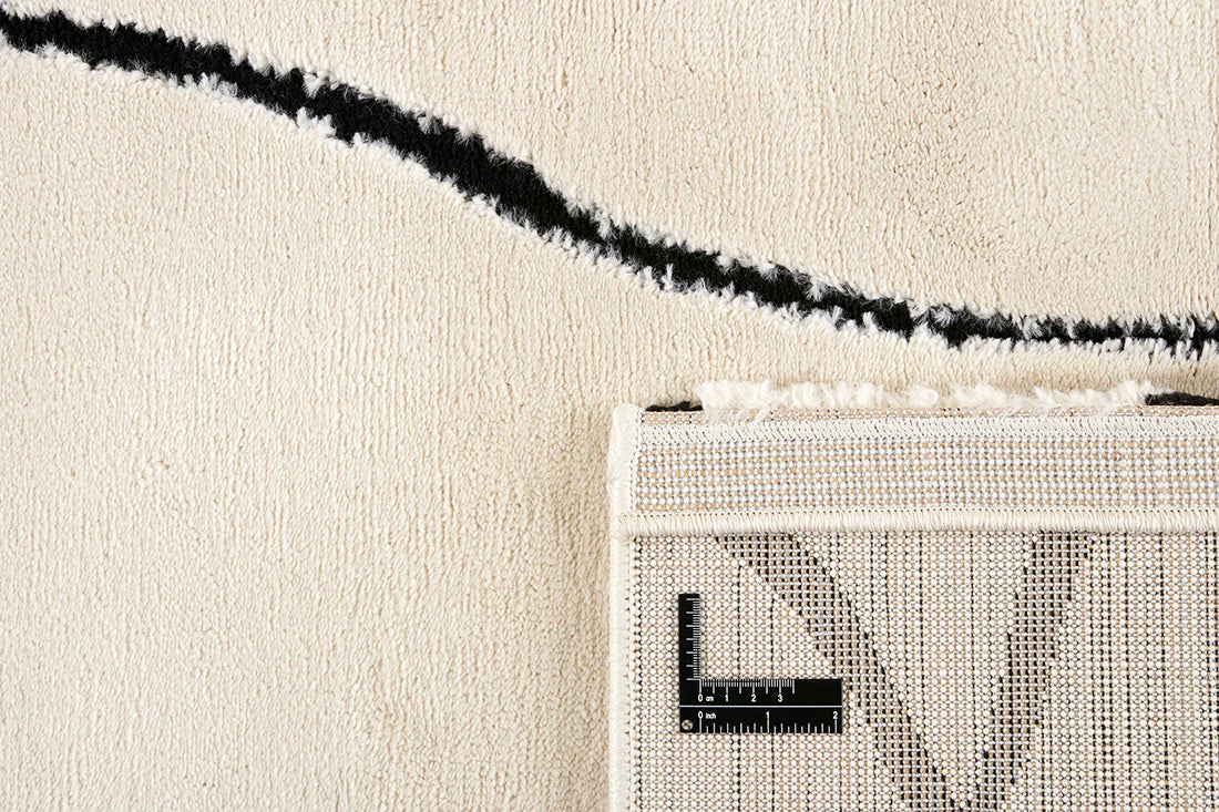 Plain cream Moroccan style rug with minimal abstract pattern