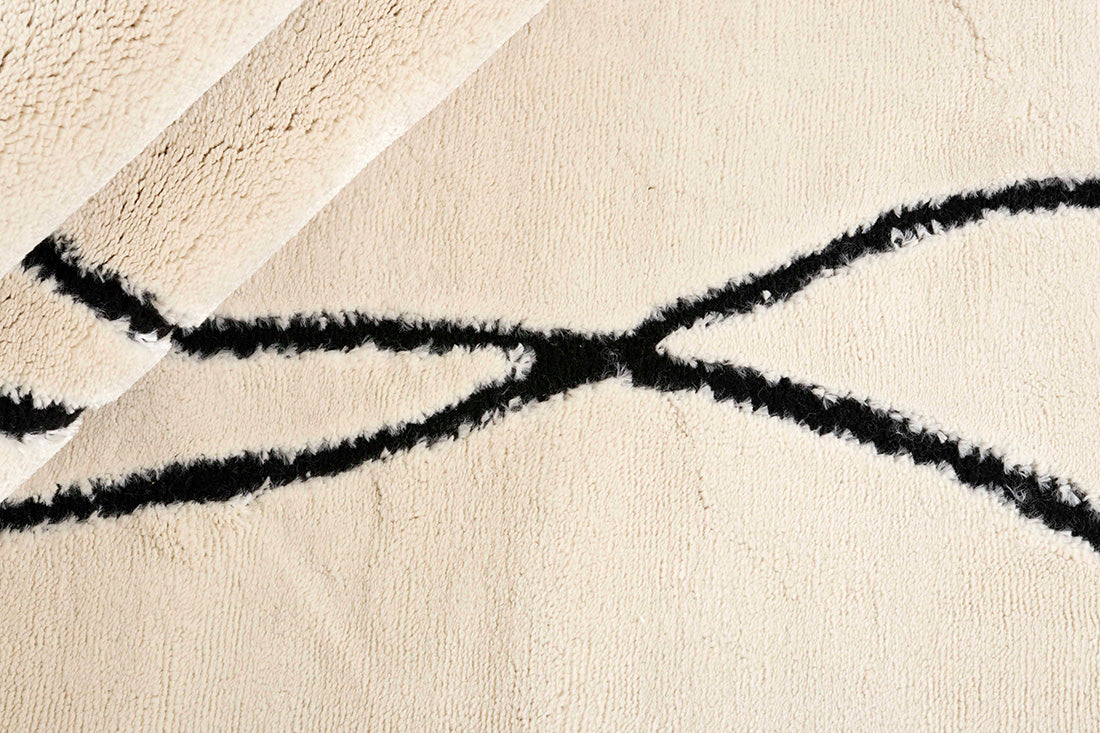 Plain cream Moroccan style rug with minimal abstract pattern