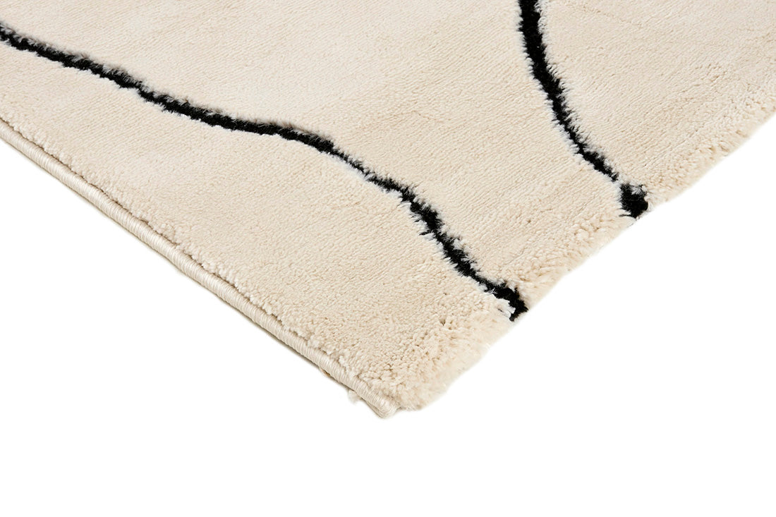 Plain cream Moroccan style rug with minimal abstract pattern