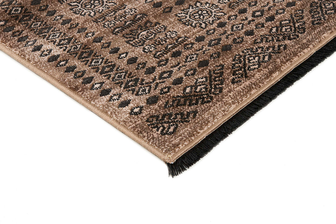 Traditional Bokhara style rug with border. In shades of brown