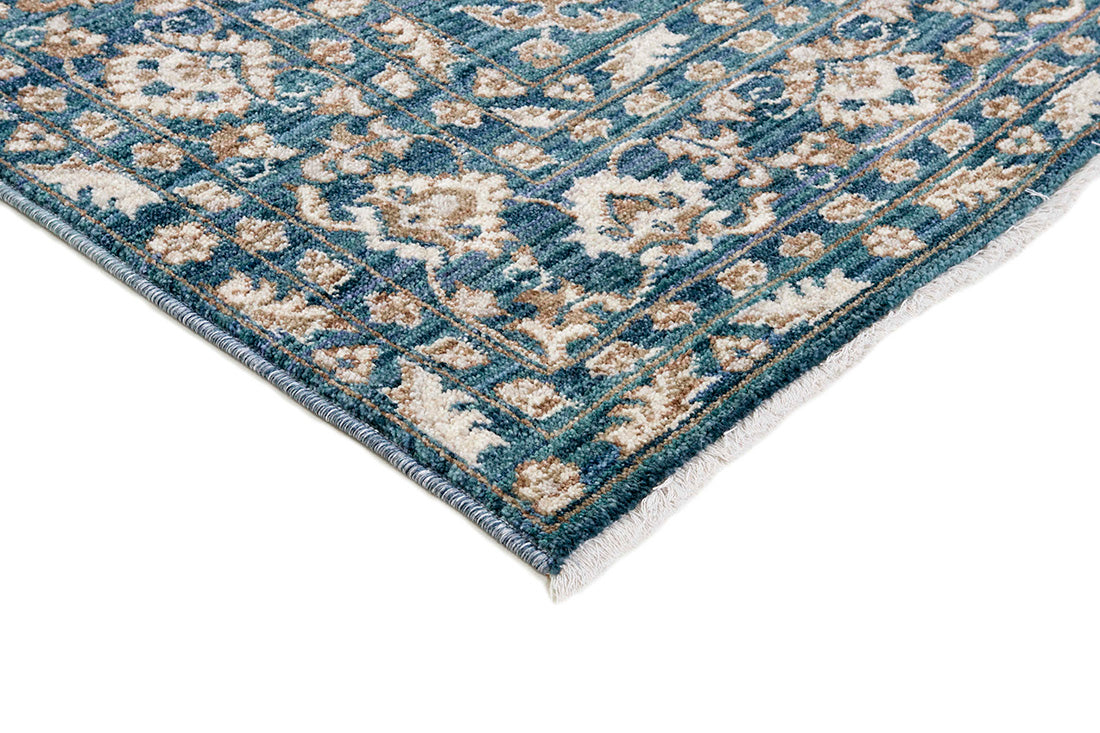 Traditional blue Ziegler-style rug with floral motif