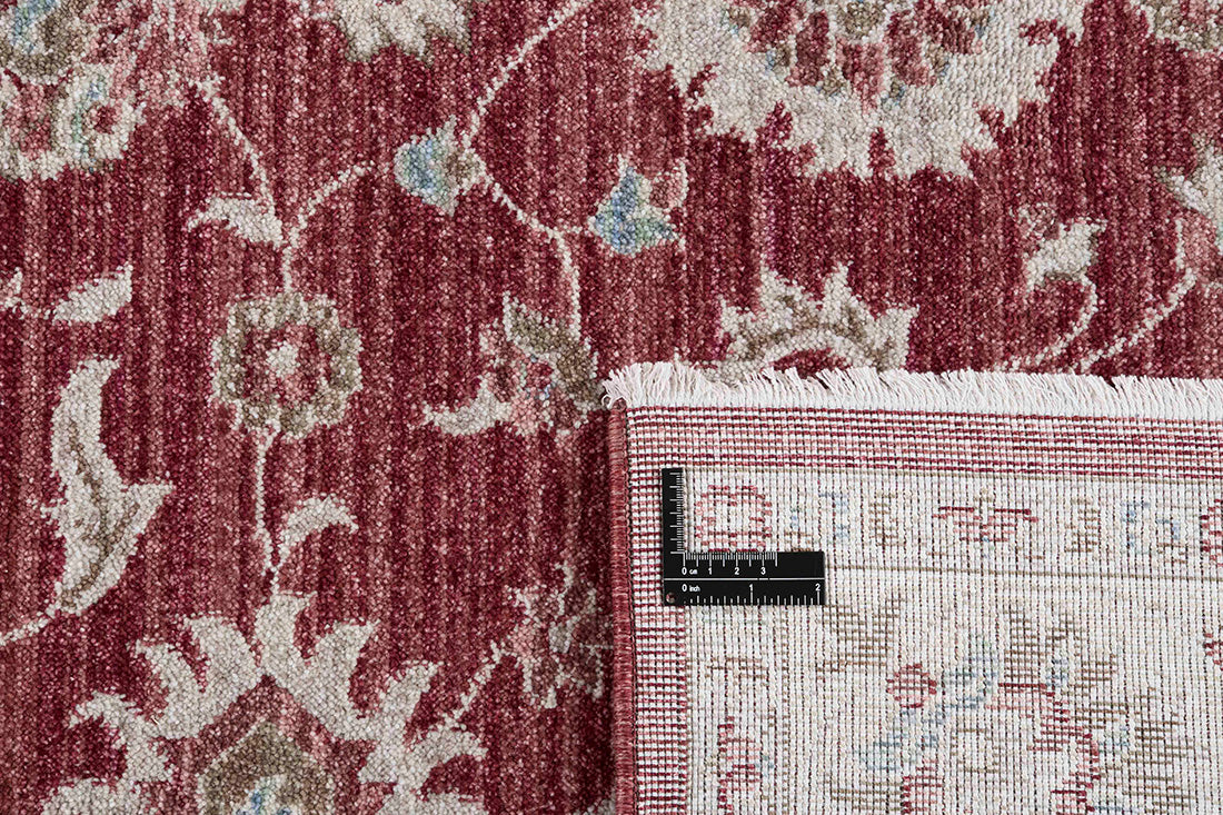 Traditional red Ziegler-style rug with floral motif