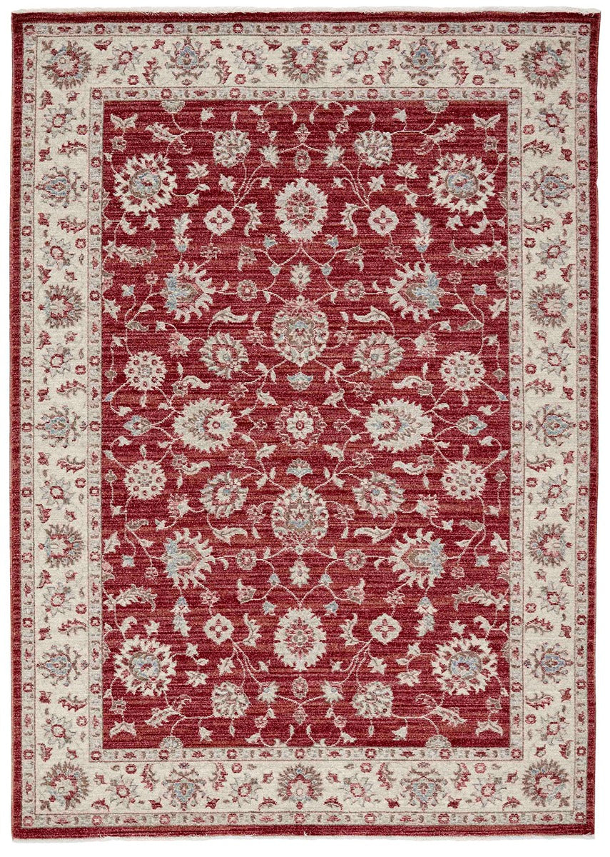 Traditional red Ziegler-style rug with floral motif