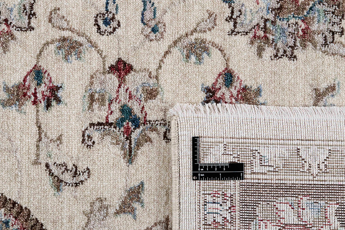 Traditional brown Ziegler-style rug with floral motif