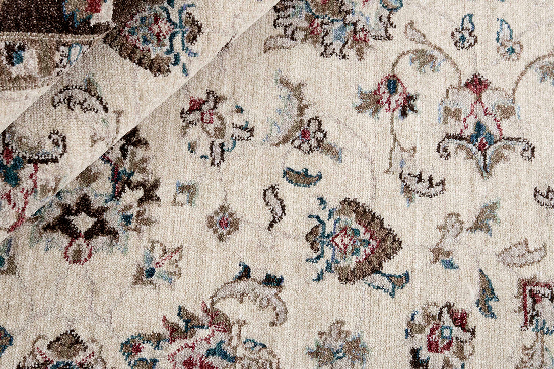 Traditional brown Ziegler-style rug with floral motif
