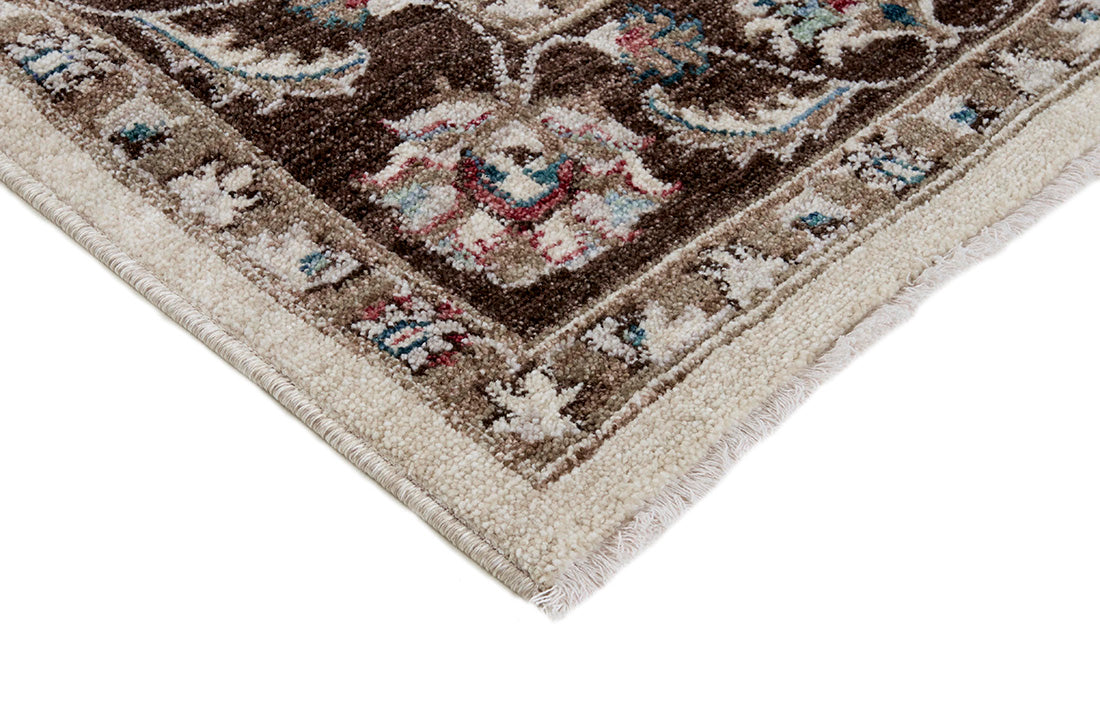 Traditional brown Ziegler-style rug with floral motif
