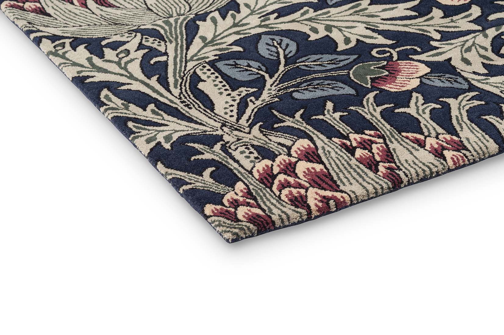 blue and red wool rug with floral print