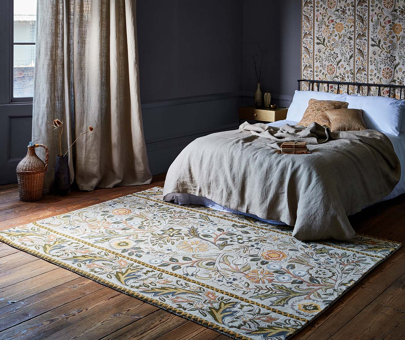 beige wool rug with multicolour floral design