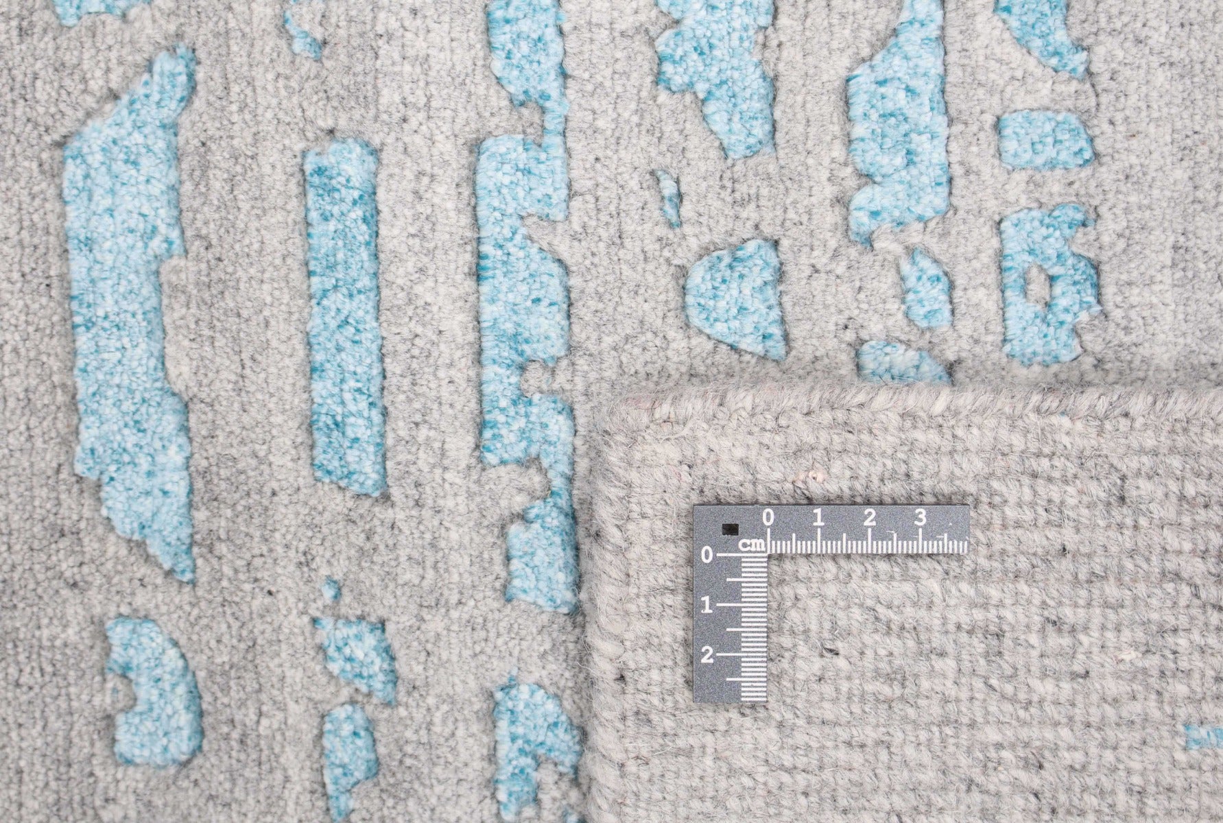 large area rug with abstract damask design in blue
