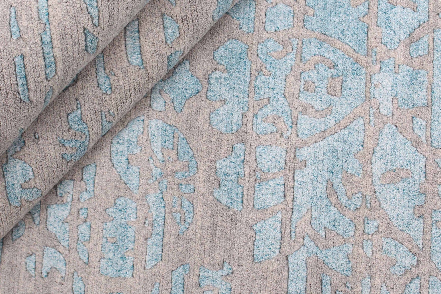 large area rug with abstract damask design in blue