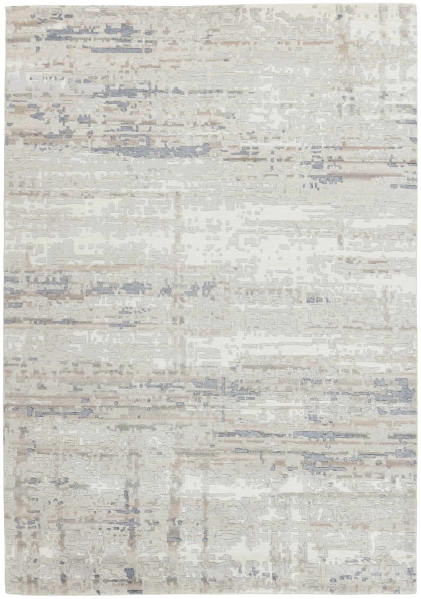 Area rug with abstract design in grey and beige