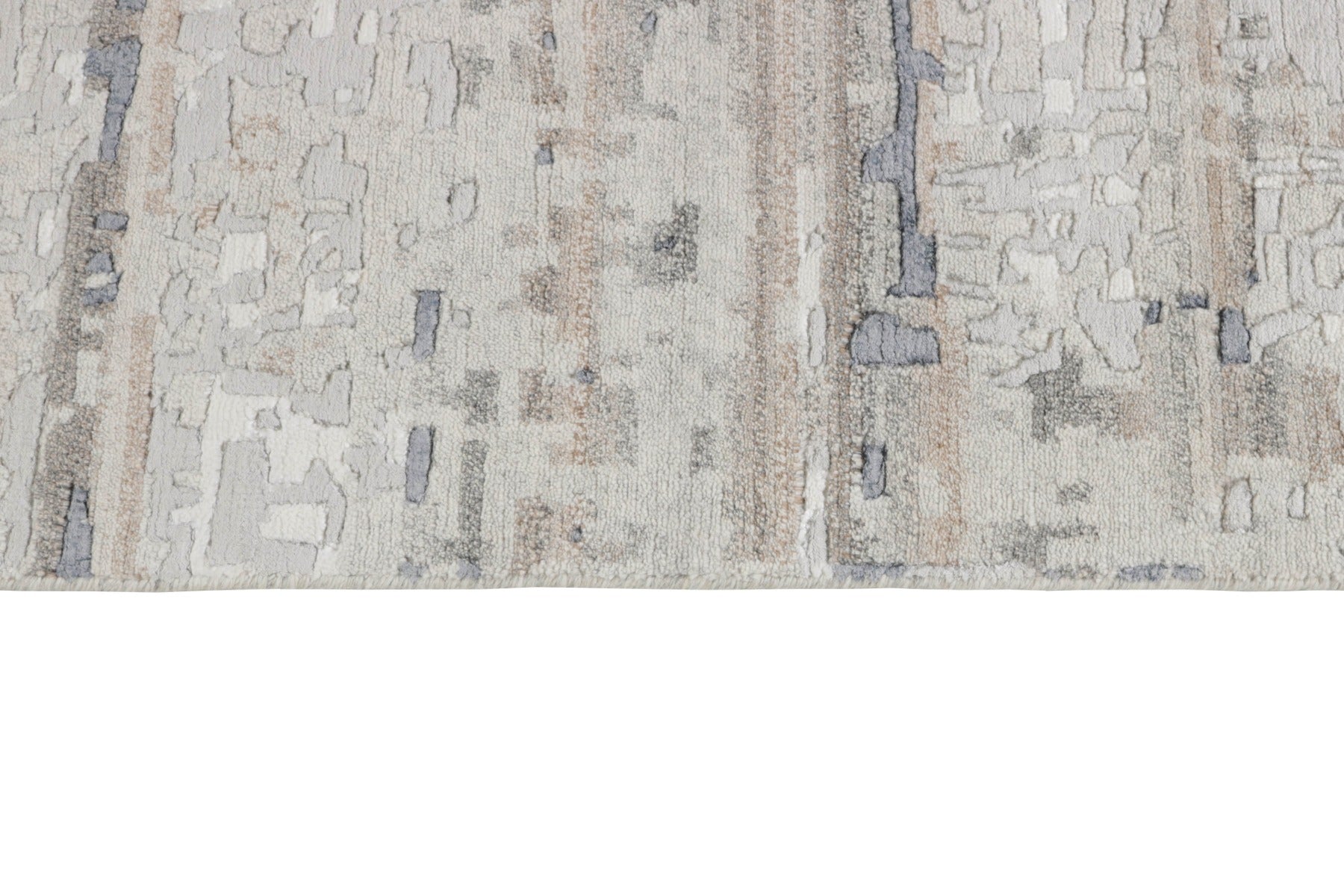 Area rug with abstract design in grey and beige