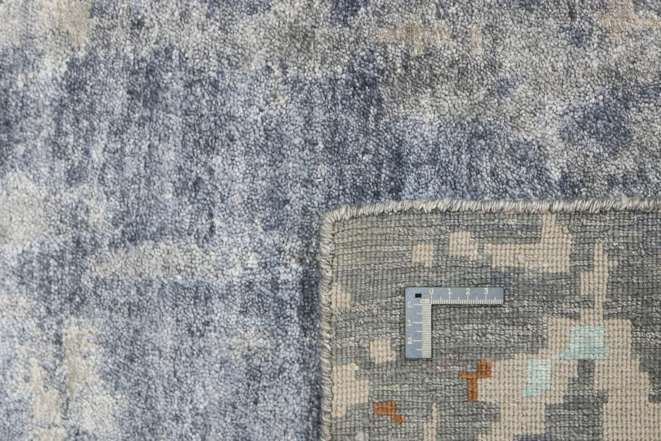 purple and terracotta abstract rug