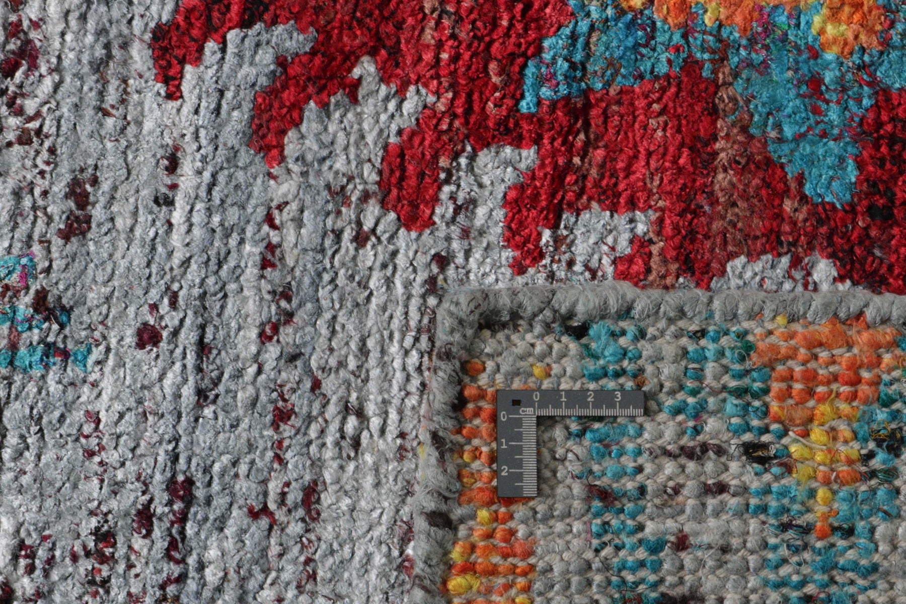 multicolour rug woven from recycled sari silks