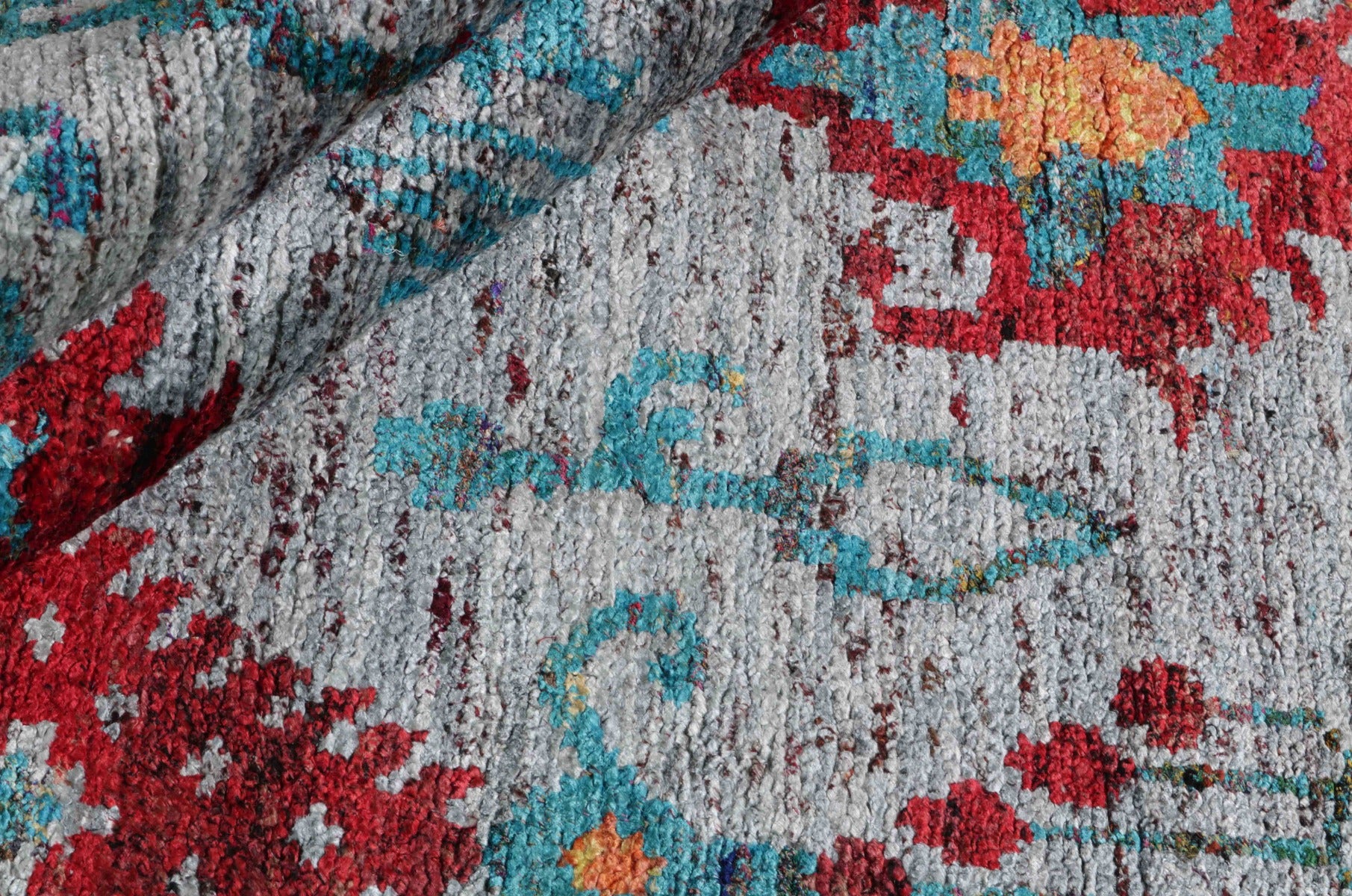 multicolour rug woven from recycled sari silks