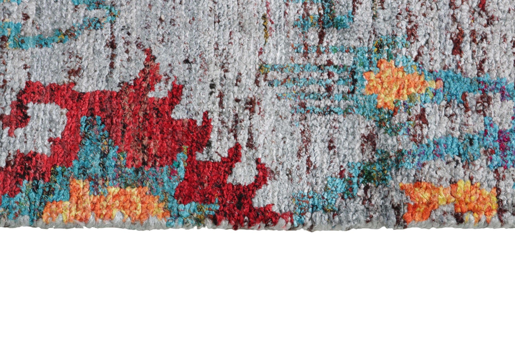 multicolour rug woven from recycled sari silks