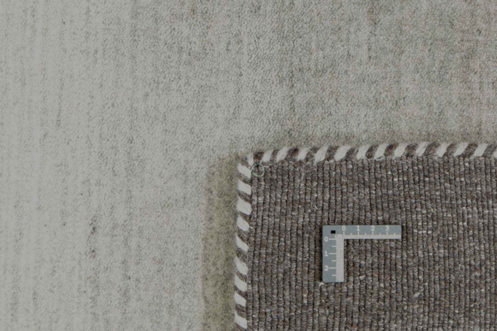 black, grey and cream ombre rug