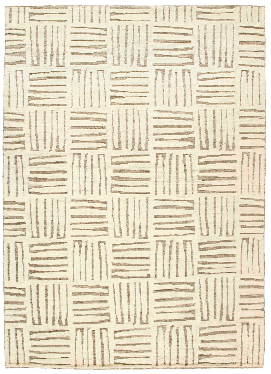 beige area rug with geometric pattern