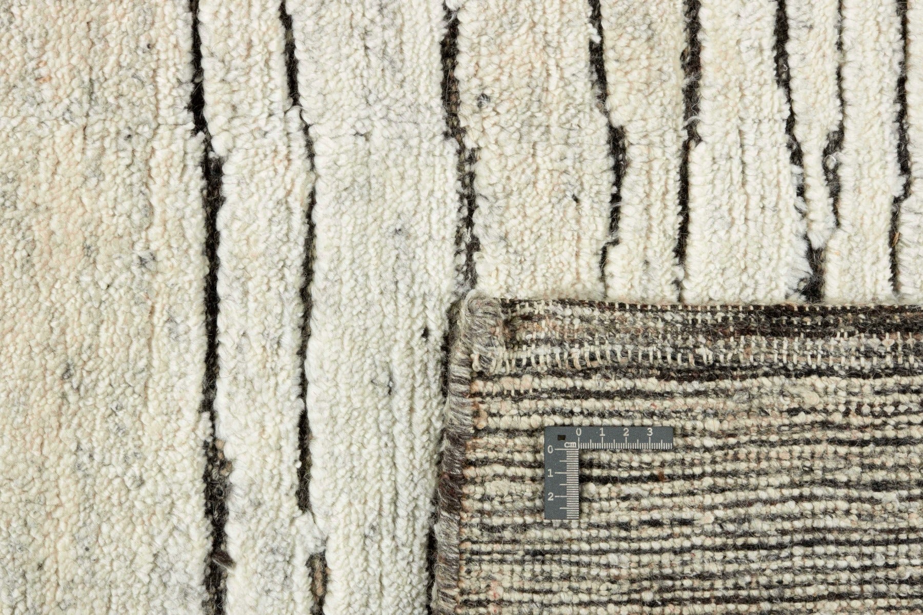 Cream area rug with abstract design