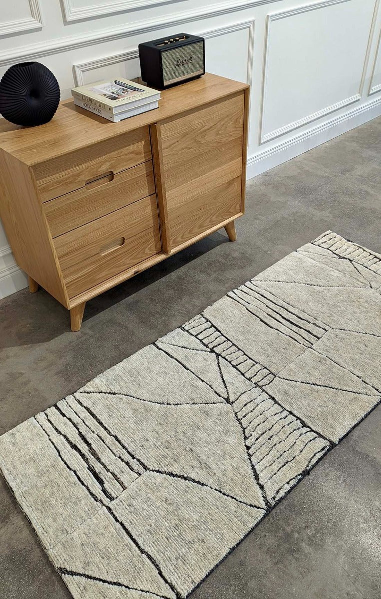 beige area runner with abstract design