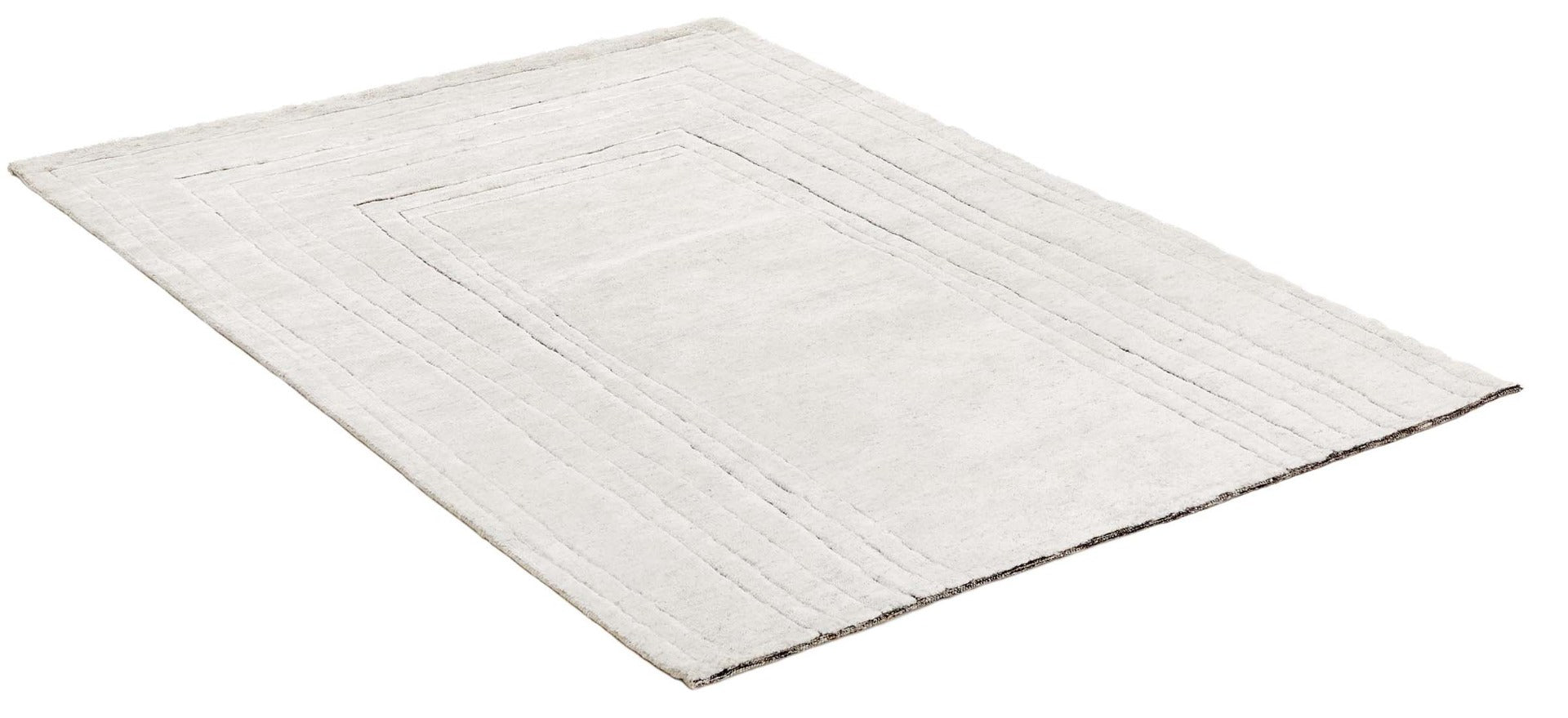 cream area wool rug with abstract design