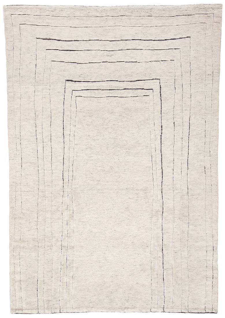 cream area wool rug with abstract design
