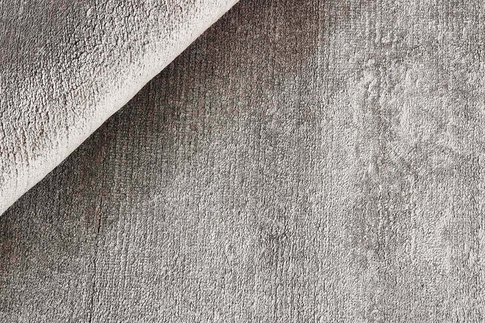 large plain grey and black viscose circle rug