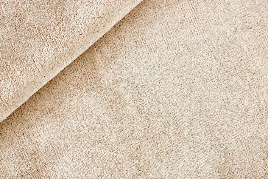 plain beige circle rug