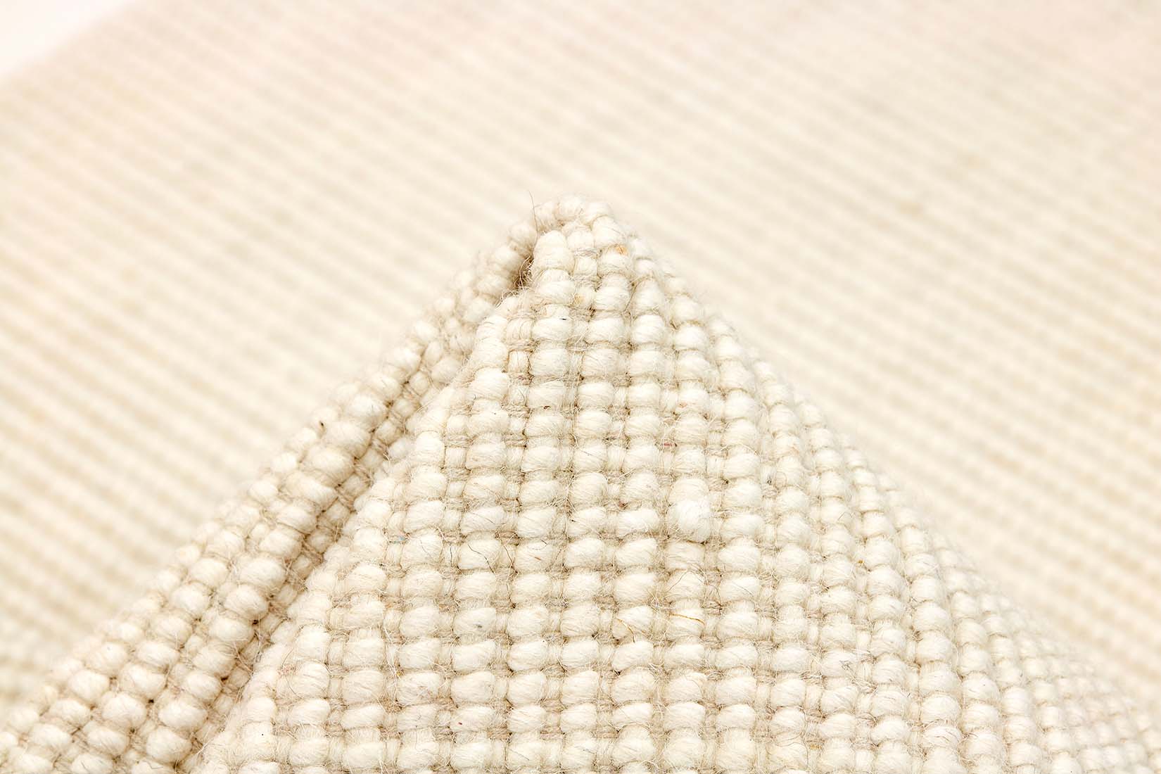 Simple white textured flatweave rug