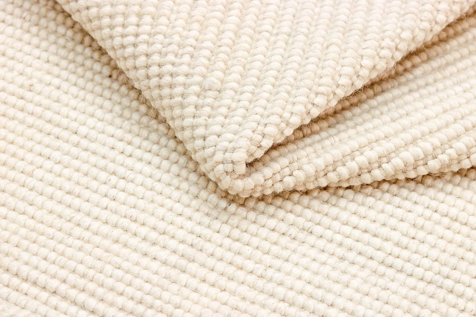 Simple white textured flatweave rug